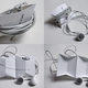 Illustration for article titled Friday Easy Origami: Business Card Becomes iPod Earbud Winder